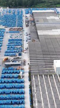 Industrial Data center in Santa Catarina, Brazil. Aerial view in vertical video. Production of porcelain tiles and large format porcelain slabs.