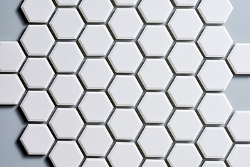 Fototapeta premium Seamless arrangement of white hexagons creating a textured, geometric background