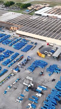 Industrial Data center in Santa Catarina, Brazil. Aerial view in vertical video. Production of porcelain tiles and large format porcelain slabs.