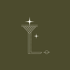 Celestial branding mark with letter L stars and planetary orbit © adit