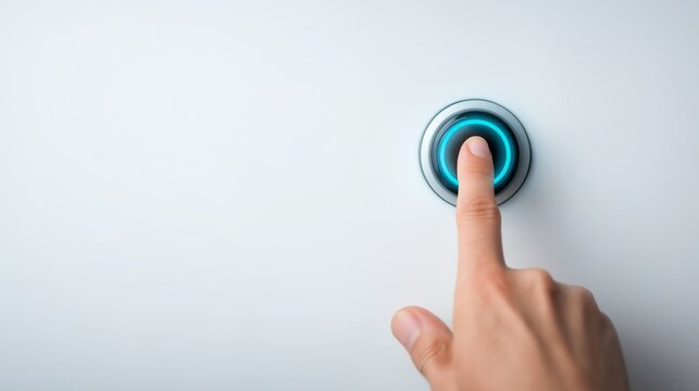Finger pressing a glowing blue button, symbolizing activation, initiation, and control in a minimalist, futuristic design