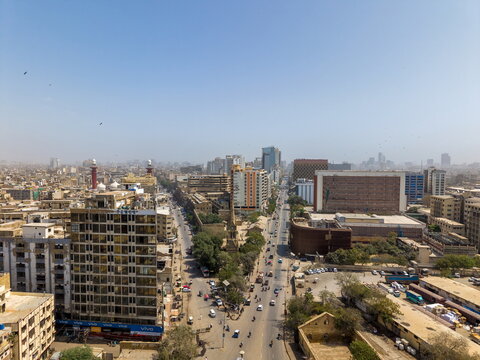 Aerial view of I.I. Chundrigar Road featuring dense urban architecture, high-rise buildings, and busy streets with traffic in Karachi, Sindh, Pakistan.