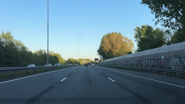 Amsterdam Netherlands highway, Urban highway traffic beneath an overhead gantry