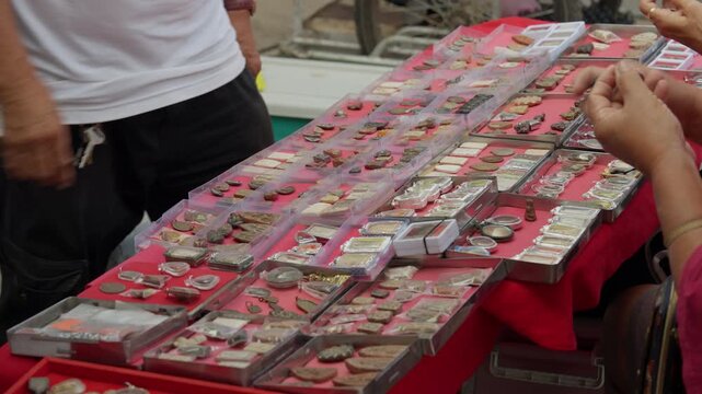 Dealer Sells Many Thai Buddhist Monk Medal Amulet Pendants at Open Street Market