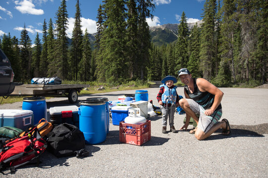 Father and son getting ready for camping trip