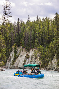 Rafting group navigating a wild river canyon