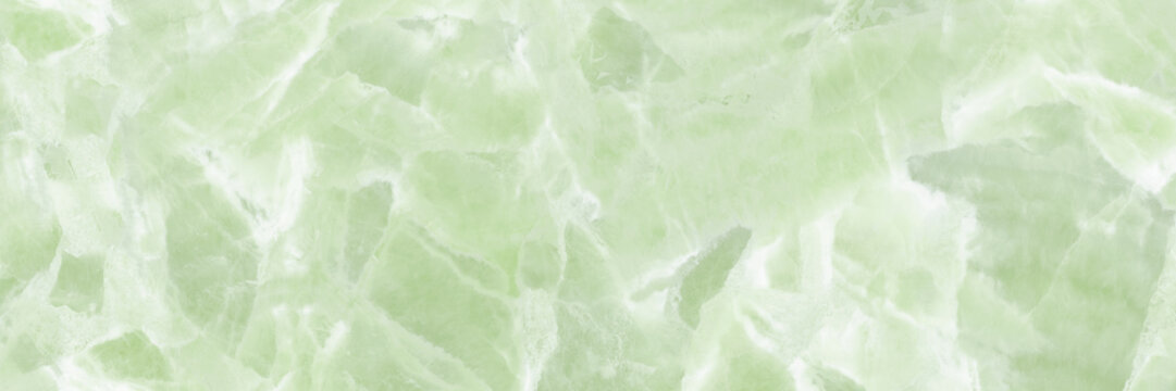 Soft green marble texture background with translucent crystal patterns and delicate natural stone details. Elegant pastel mineral surface featuring organic shapes and a calming abstract aesthetic.