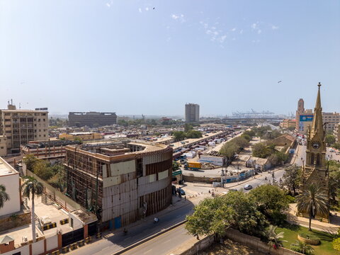 Aerial view of the historic Merewether Clock Tower and surrounding urban landscape along I.I. Chundrigar Road in Karachi, Sindh, Pakistan.