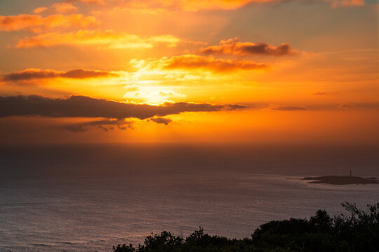 Spectacular sunset over ocean from a lookout