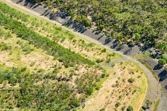 Landfill and storm water gullies with horses (brumbies) on Curtis Island