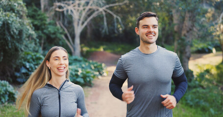 Fototapeta premium Fitness, happy or couple in nature with running, exercise together or bonding in physical activity. Smile, athletes or people on path with jog, cardio training or workout connection in active hobby.