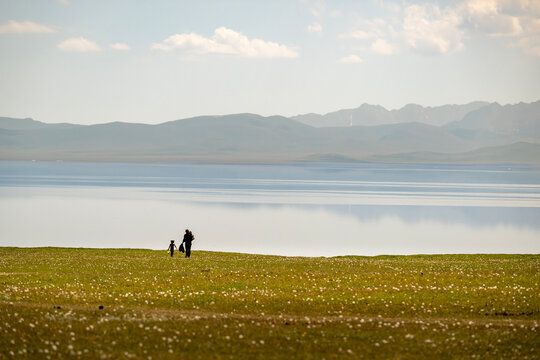 Man and Child by Son Kul Lake Kyrgyzstan