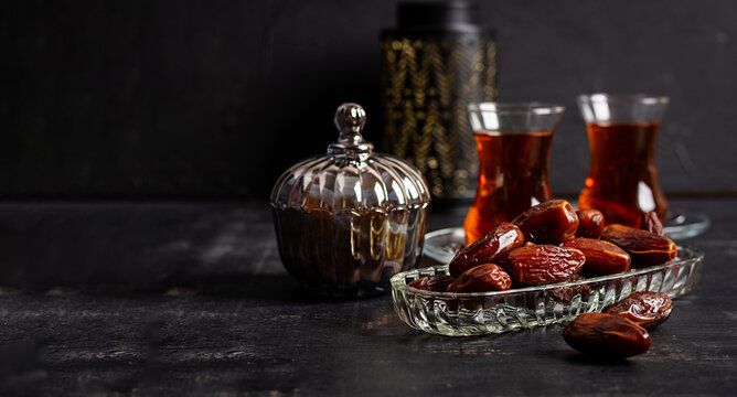 Sweet Dates and Hot Tea for Ramadan Celebration. Banner
