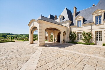 Obraz premium Classic boutique estate facade with formal garden for premium tourism design