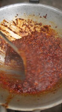 Nam Prik Phao Moo Sab, Thai chili paste preparation with minced pork and palm sugar.