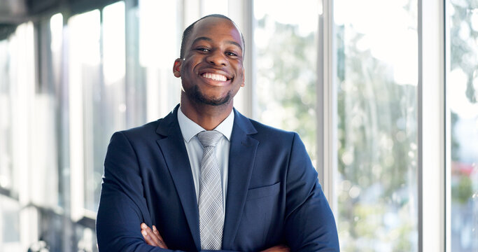 Portrait, businessman and attorney in office with arms crossed, legal experience and pride for career. Happy, black person and corporate lawyer in firm with confidence, law compliance and about us.