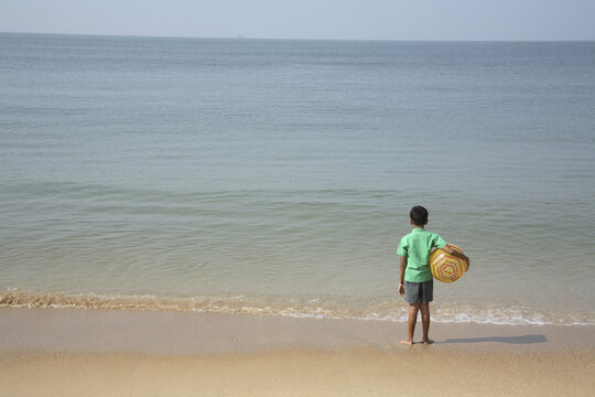 little boy playing on beach MR#703G