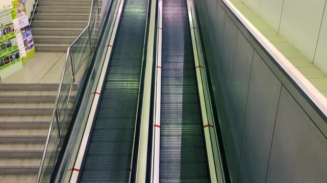 Moving escalator in airport.