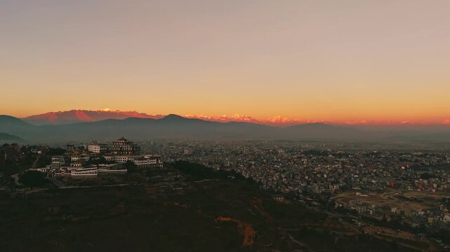 Buddhist Monastery on Hilltop at Dusk Himalayan Backdrop Kathmandu Valley Nepal	