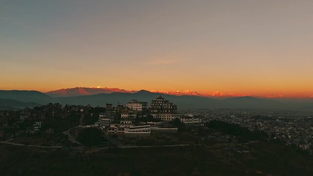 Aerial Buddhist Monastery Hilltop Golden Hour Himalayan Snow Peaks Kathmandu	