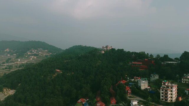 Aerial Drone View Buddhist Monastery Hilltop Green Forest Kathmandu Nepal Overcast	