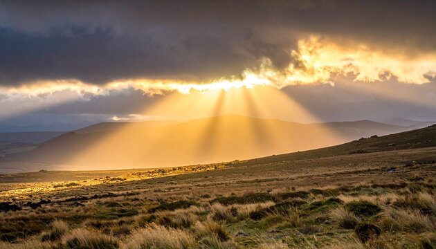 Golden sunrise breaking through dramatic clouds with radiant light rays