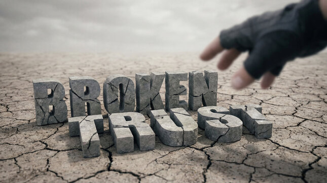 Hand reaching for broken trust 3d text in cracked desert ground, symbolizing betrayal, relationship struggles, and downfall