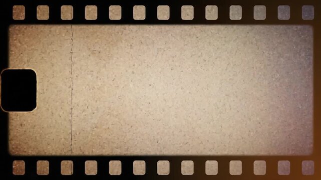 Vintage film strip frames showcasing aged textures and nostalgic ambiance on a retro background