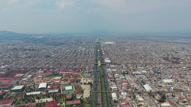 Wide drone perspective of the Valley of Mexico urban landscape