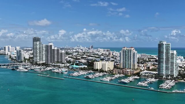 Hyperlapse Miami marina with luxury yacht. Summer vacation. Luxury South beach marina. Luxury yacht. Miami south beach aerial view. Marina in Miami, Florida hyperlapse. Harbor hyperlapse view