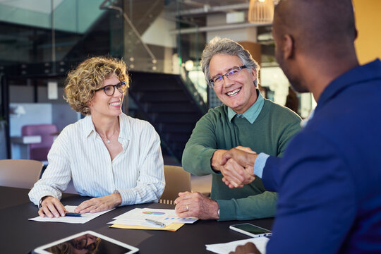 Businessman shaking hand after meeting with a new client