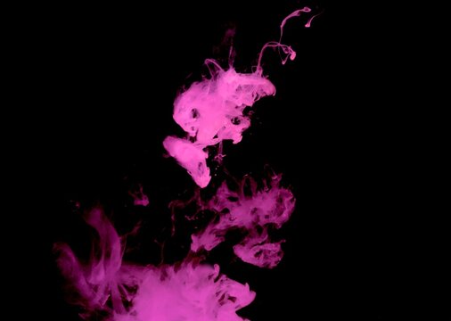 Pink colorful fluorescent smoke on black background,Art abstract smoke texture,Colored liquid dye,Splash paint,Abstract color,Abstract Textures
