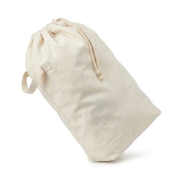 Canvas drawstring bag for laundry or storage isolated on white background