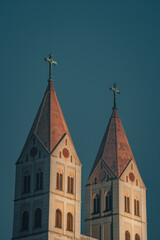 Obraz premium Twin spires of a historic European-style church in Qingdao against dark sky