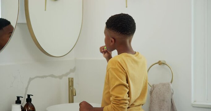 Morning, toothbrush and mirror with black child in bathroom for brushing teeth, cleaning and dental. Self care, oral hygiene and gum health with kid in home for plaque prevention, mouth and wellness