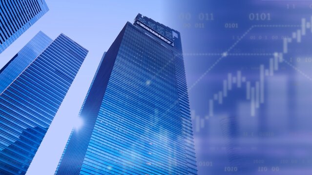 Skyscrapers with a digital stock market graph overlay, blue tones.