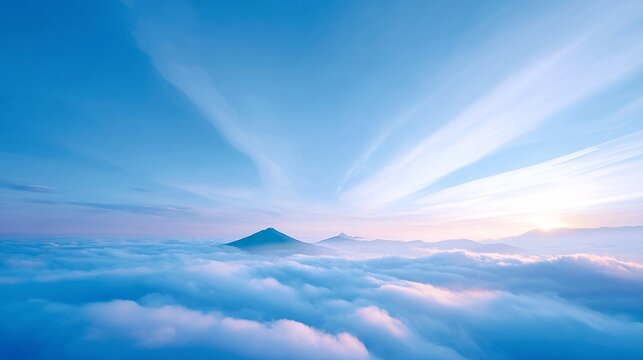 Aerial sea of clouds abstract background with mountain peaks sil