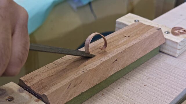 Carving wood with chisel