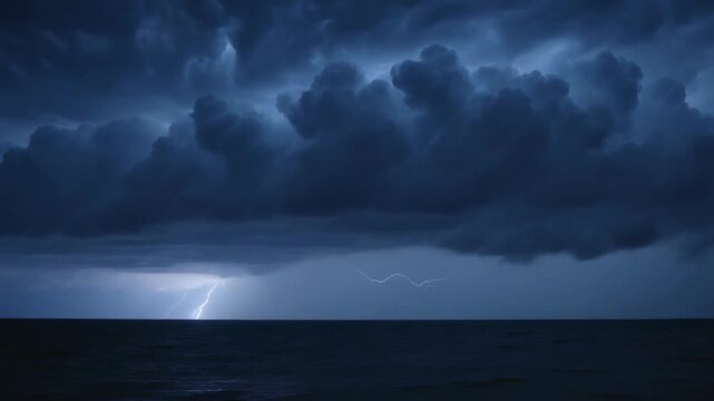 Sparking low shelf cloudbase emitting vertical then sideways lightning at sea, lighting water