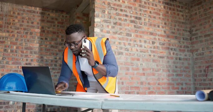 Architect, phone call and laptop with black man in building for structure engineer, construction and contact. Contractor, site plan and real estate developer with employee for talk and project