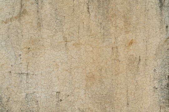 Beige cracked concrete texture background, Vintage weathered cement wall backdrop.