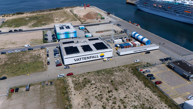 IJmuiden, Netherlands - June 19, 2026: Aerial view of a Vattenfall offshore wind facility and O&M facilities building in the harbor area of IJmuiden. Industrial port scene.