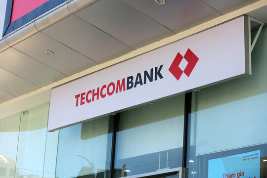 NHA TRANG, VIETNAM - JANUARY 26, 2026: The corporate red and white 3D sign letters of Techcombank displayed on a building facade.