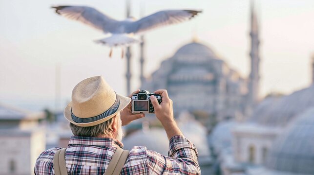 Traveler capturing historical architecture and a flying seagull in Istanbul, exploring ancient city landmarks