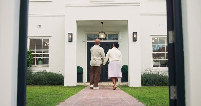 Senior, couple and walk home with talk for morning fresh air, retirement support and bonding. Pensioner, back of black people or holding hands in front yard for romantic stroll, conversation and love