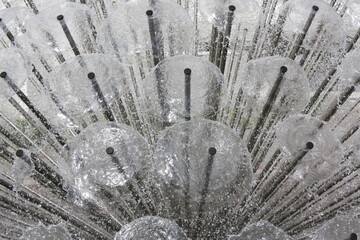 Spherical fountains create a mesmerizing display of water and light in a modern urban space © Marsy