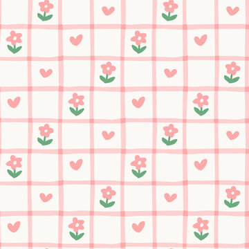 Seamless pattern of hand drawn pink checkered grid with mini tulips and hearts
