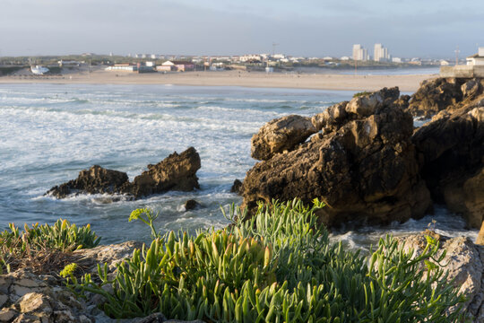 Beach and rocky outcrop in the early morning.