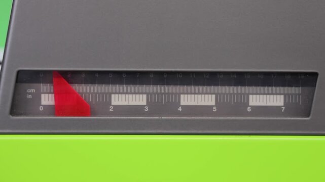 Moving Triangular Red Pointer Dual Scale Ruler inch and cm at Machine in Factory