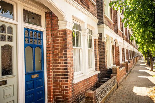 LONDON - red brick terraced houses on residential street